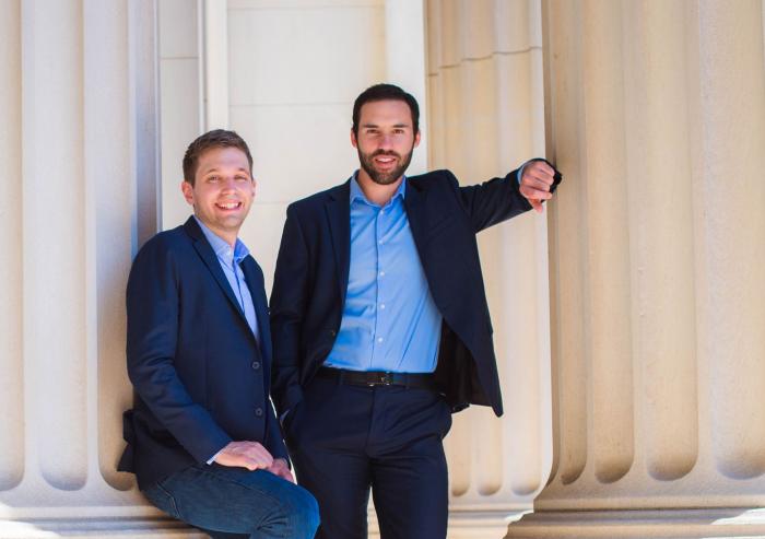 Matt Ellis PhD ’17 (left) and Sam Shaner SM ’14 PhD ’18 have designed a nuclear reactor that deploys a molten nitrate salt coolant that allows the reactor to reach higher operating temperatures than current water-cooled reactors.Photo...