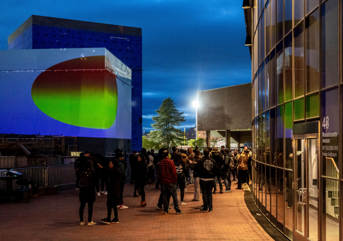 
              Onlookers gathered at the site of the interactive Climate Machine art installation on April 19.
              Photo: Caitlin Cunningham
      