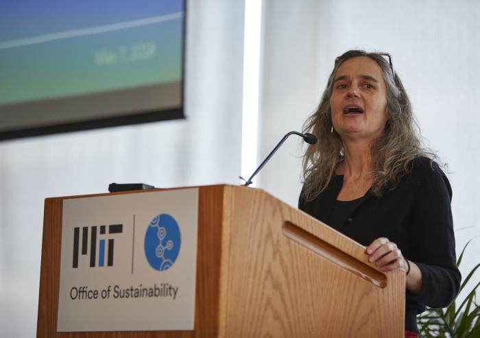 Prof. Heather Paxon speaking at Sustainability Connect in 2018, women at podium talking