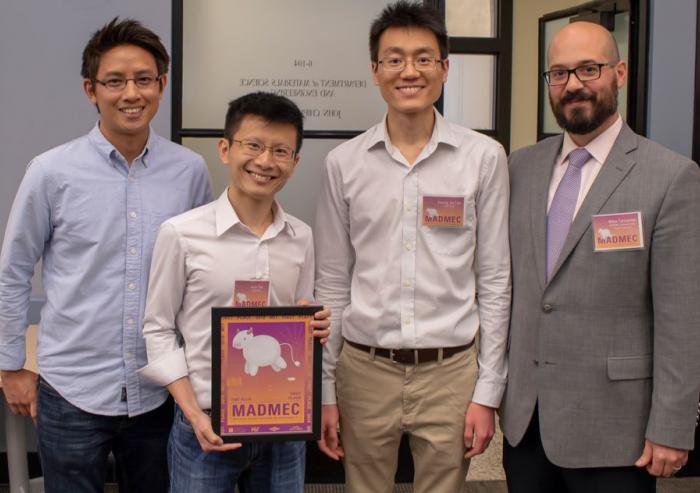 The Fiat Flux team earned the $10,000 first-place prize for its prototype of a self-cleaning water filtration system. Team members pose with Michael Tarkanian (right), a senior lecturer in the Department of Materials Science and Engineering (DMSE...