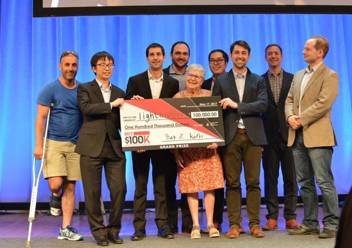 The winning team Lightmatter pose with organizers and friends.Photo: Samuel Adelman The winning team Lightmatter pose with organizers and friends.Photo: Samuel Adelman