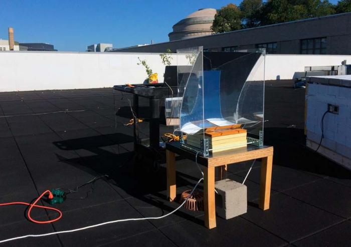In this experiment, the new steam-generating device was mounted over a basin of water, placed on a small table, and partially surrounded by a simple, transparent solar concentrator. The researchers measured the temperature of the steam produced ove...