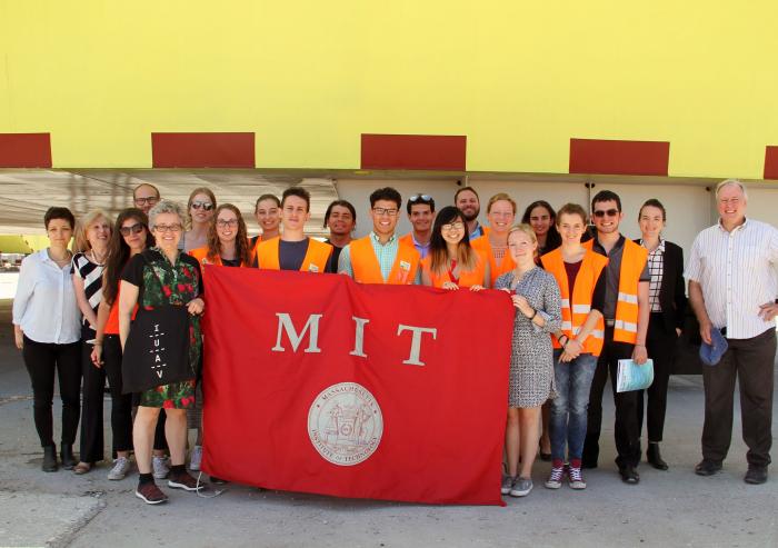 MIT students, students from the University of Venice, and faculty members from both institutions pose in front of Venice's experimental floodgates as part of a collaborative summer workshop. Photo: Lily Keyes