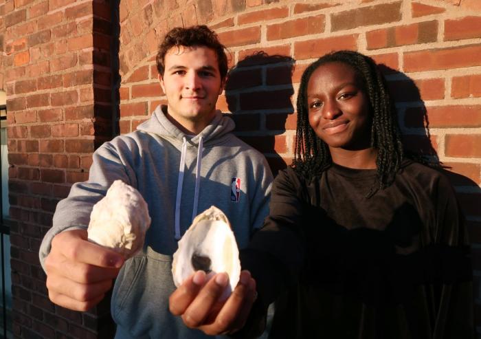 
              MIT students Santiago Borrego (left) and Unyime Usua are working with MIT Sea Grant to develop image-recognition tools that will help aquaculture hatcheries monitor shellfish seed.
              Photo: Lily Keyes
      