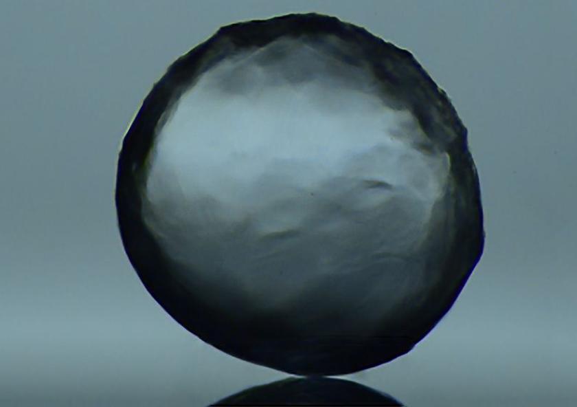 A new surface coating developed by Kripa Varanasi and his team causes water to bead up on the inner surface of a pipe rather than spreading out. This prevents the formation of ices that could lead to a clog in an oil pipeline or well.Image courtes... A new surface coating developed by Kripa Varanasi and his team causes water to bead up on the inner surface of a pipe rather than spreading out. This prevents the formation of ices that could lead to a clog in an oil pipeline or well.Image courtes...