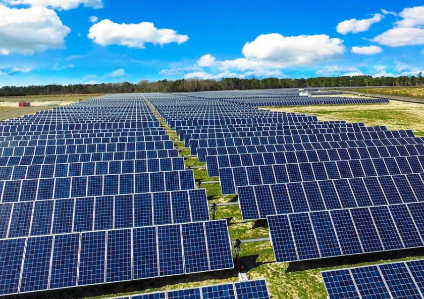 This aerial view shows a similar solar farm in North Carolina, using the same type of solar panels, illustrating what the new project will look like when it is completed by the end of this year. This aerial view shows a similar solar farm in North Carolina, using the same type of solar panels, illustrating what the new project will look like when it is completed by the end of this year.
