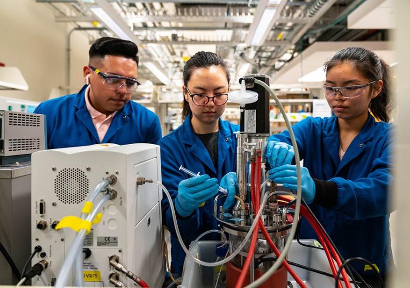 Left to right: Sebastian Esquivel, Jenna Ahn, and Crystal Chen break down whey, normally a byproduct, into components for use in animal feed. Image: Lillie Paquette / School of Engineering Left to right: Sebastian Esquivel, Jenna Ahn, and Crystal Chen break down whey, normally a byproduct, into components for use in animal feed. Image: Lillie Paquette / School of Engineering