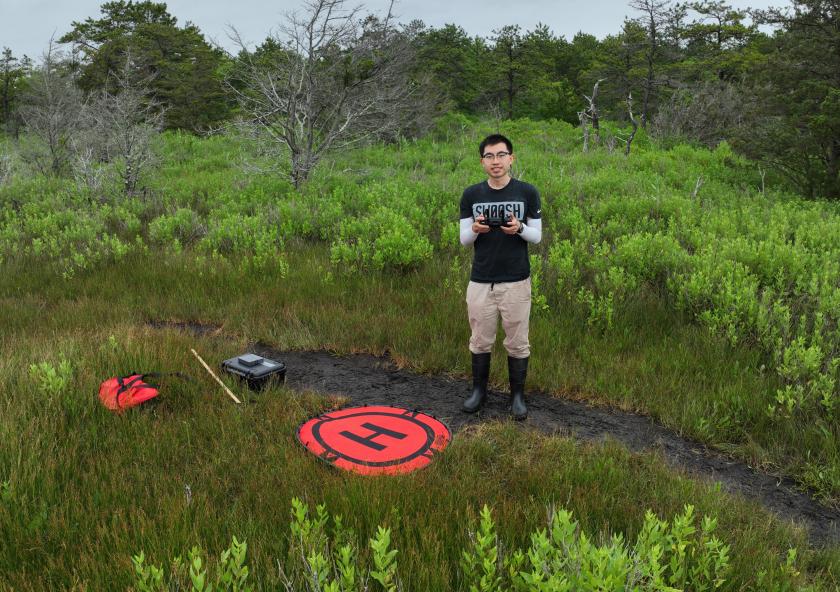 Graduate student Ernie I. H. Lee uses drone imaging and machine learning to help map salt marsh species, plant height, and shoots per bed area. Graduate student Ernie I. H. Lee uses drone imaging and machine learning to help map salt marsh species, plant height, and shoots per bed area.