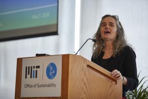 Prof. Heather Paxon speaking at Sustainability Connect in 2018, women at podium talking
