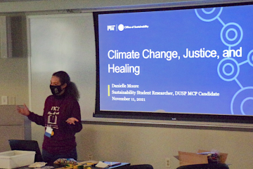 Danielle Moore giving presentation at MC2 conference