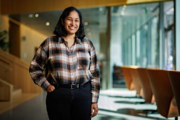 Priya Donti, an MIT electrical engineering and computer science professor, studies how machine learning can make the power grid more efficient and resilient.