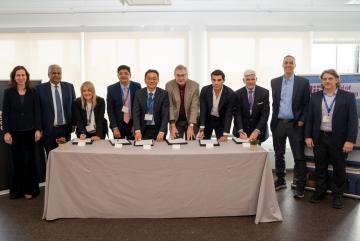 Representatives from across the MIT Maritime Consortium attended a signing ceremony at MIT. Left to right: Fotini Christia (MIT), Anantha Chandrakasan (MIT), Chara Papaefthymiou (Navios), Amulya Mohapatra (Foresight Group Services), Kwangpil Chang (HD KSOE), Chris Wiernicki (ABS), Miltiadis Marinakis (Capital), John Lycouris (Dorian LPG), Daniel Huttenlocher (MIT), and Themis Sapsis (MIT).