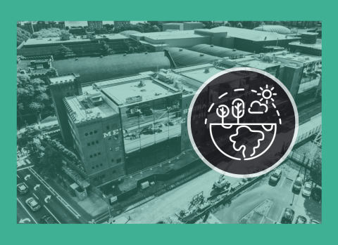 Aerial view of a large urban building, with busy streets and parked cars, overlaid by an eco-friendly icon featuring trees, a sun, and a globe, set in a green frame.