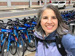 woman in front of bike share