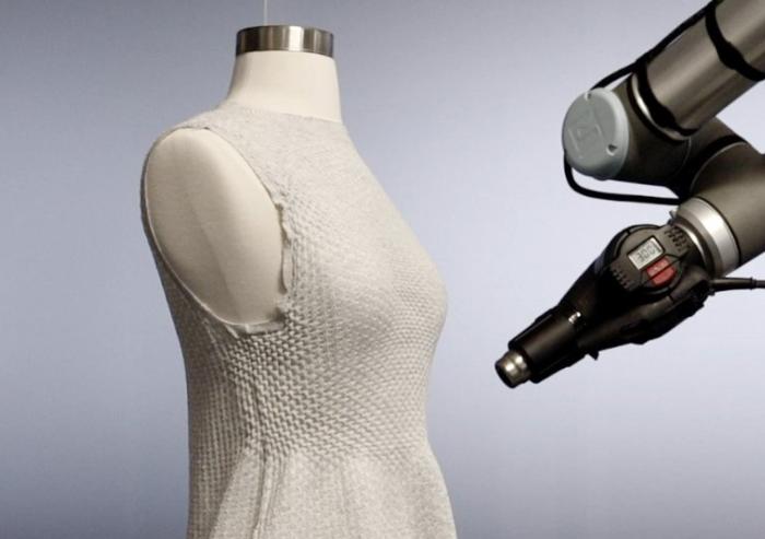 
              In late 2023 the MIT Self Assembly Lab and the high-tech fashion company Ministry of Supply debuted their 4D Knit Dress at the latter's store Boston, complete with a robotic arm working its way around a dress as customers watched. 
 ...