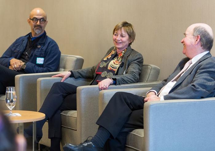 As part of MIT Climate Night, MIT Vice President for Research Maria Zuber (center) talks with John Fernández, director of the MIT Environmental Solutions Initiative (left) and Robert Armstrong, director of the MIT Energy Initiative, about thei...