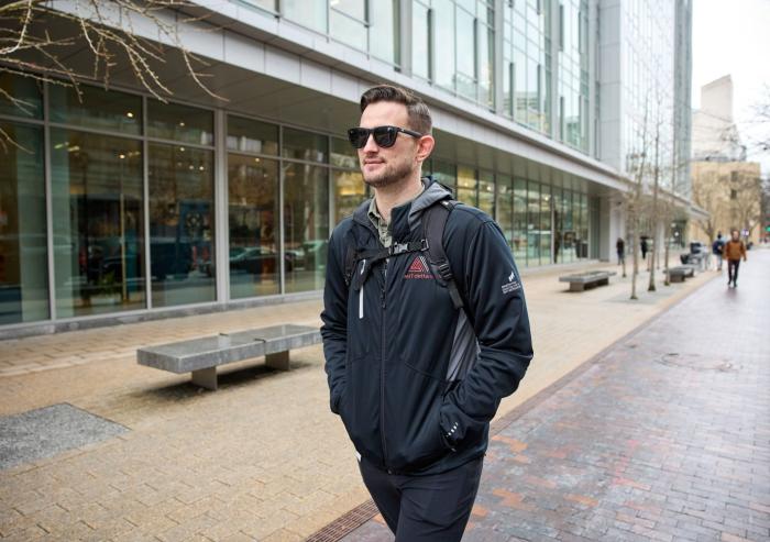 MIT Sloan MBA student David Brown, the co-founder of Helix Carbon, walks through Kendall Square in Cambridge, Massachusetts.