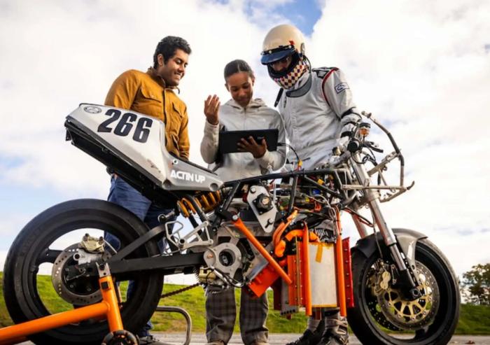 Electric Vehicle Team members (from left to right) Anand John, Rachel Mohammed, and Aditya Mehrotra '22, SM '24 monitor their bike’s performance, battery levels, and hydrogen tank levels to estimate the vehicle’s range.