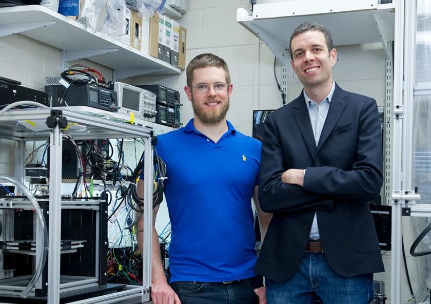 Associate Professor A. John Hart (right), doctoral student Adam Stevens SM ’15, and their colleagues have designed a 3-D printer that can deposit material 10 times faster than today’s desktop models can. The team has also developed a nove...