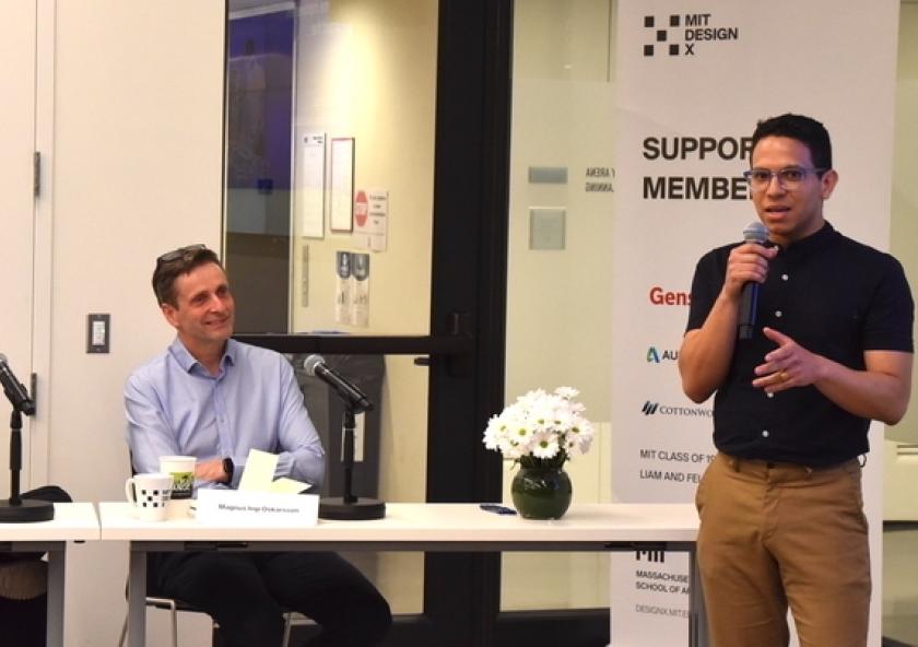 
              Miguel Dávila Uzcátegui (right) addresses questions from a panel of judges.
              Photo: Maria Iacobo
      