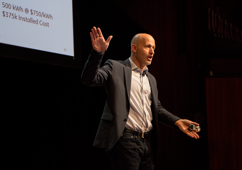 Glen Merfeld, product science leader at GE Global Research, points to almost 40,000 wind turbines installed globally during the 2016 Materials Day Symposium at MIT.