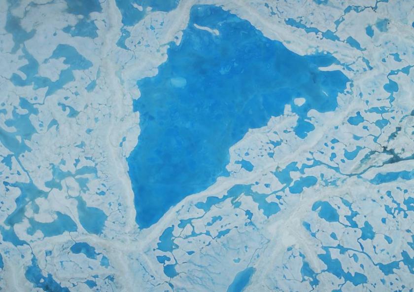 A large pool of meltwater over sea ice in the Beaufort SeaNASA/Operation IceBridge