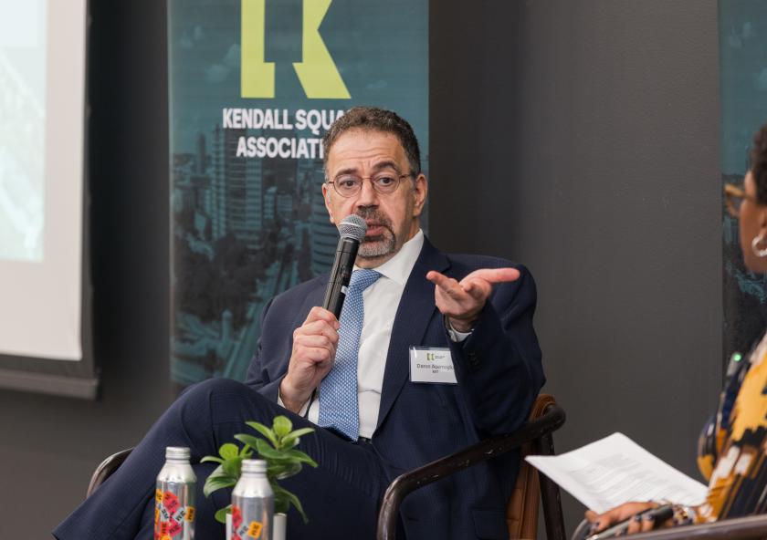 Daron Acemoglu speaks on stage with Aisha Losche. “I believe liberal democratic institutions, together with the norms that support them, are one of the greatest human achievements,” he said.