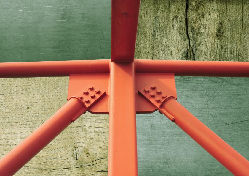 A new analysis by MIT researchers could help architects and builders reduce the carbon footprint of truss structures, the crisscrossing struts that bolster bridges, towers, and buildings.
Image: MIT News, iStockphoto
A new analysis by MIT researchers could help architects and builders reduce the carbon footprint of truss structures, the crisscrossing struts that bolster bridges, towers, and buildings.
Image: MIT News, iStockphoto