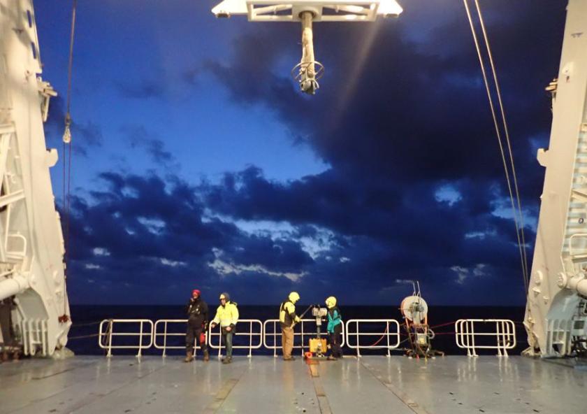 Scientists prepare to deploy an underway CTD from the back deck of a research vessel.Image: Amala Mahadevan