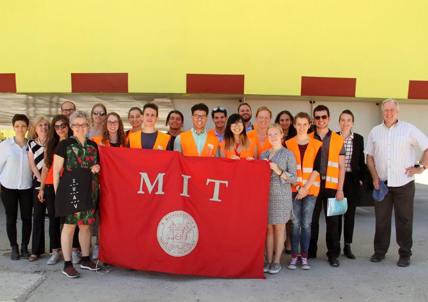 MIT students, students from the University of Venice, and faculty members from both institutions pose in front of Venice's experimental floodgates as part of a collaborative summer workshop. Photo: Lily Keyes
