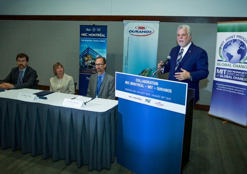 Québec Premier Philippe Couillard delivers remarks after Professor Pierre-Olivier Pineau, chair in energy sector management at HEC Montréal; MIT Vice President for Research Maria Zuber; and Ouranos Executive Director Alain Bourque sign a...