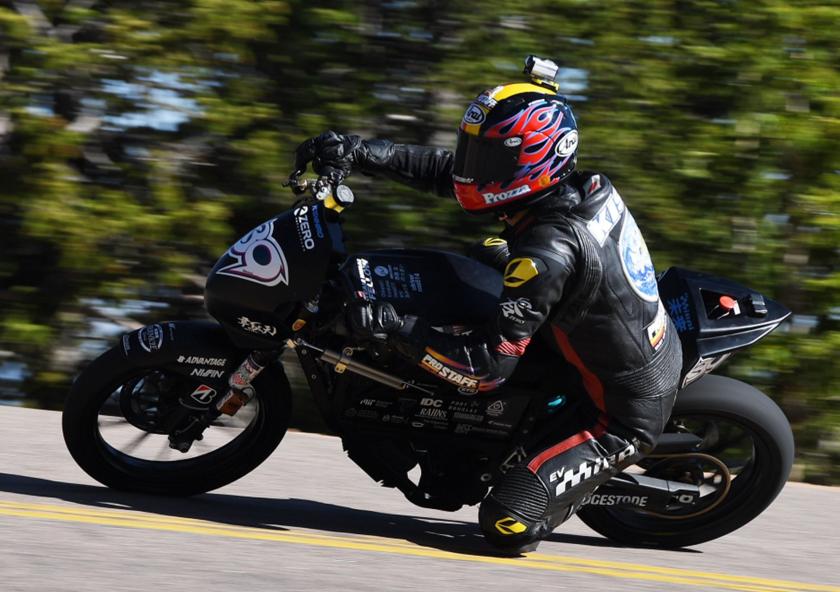 Professional rider and founder of Mirai EV of Japan Yosihiro Kishimoto rides the electric bike designed by the KOMMIT Electric Vehicle Team.