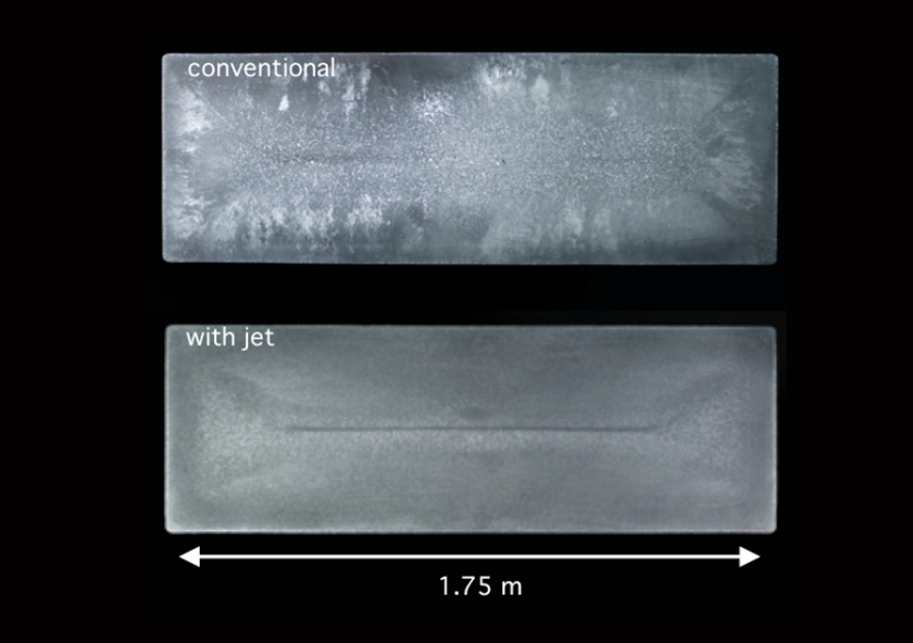 Solidified cross-sections from aluminum ingots were made using a conventional method (top) and a new jet metal process developed by MIT researchers. “The introduction of the jet induced a completely different recirculation of the grains, an...