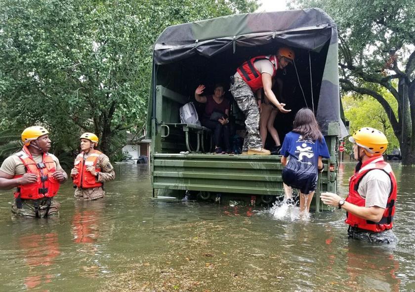 Texas Army National Guardsmen help Houston residents affected by flooding caused by Hurricane Harvey board a military vehicle. "With an event like this," says MIT associate professor of urban planning Brent Ryan, "it becomes viscerally evident whic...