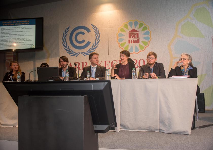 MIT Climate CoLab's Laur Hesse Fisher (third from right) speaks at a Cities Climate Finance Leadership Alliance COP 22 side event on Nov. 15.Photo: Emily Dahl/MIT Energy Initiative