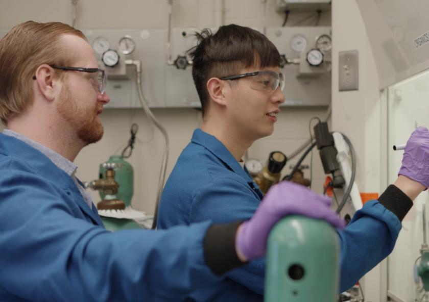 Glen Junor (left) and Fang-Yu Kuo work in the lab. 