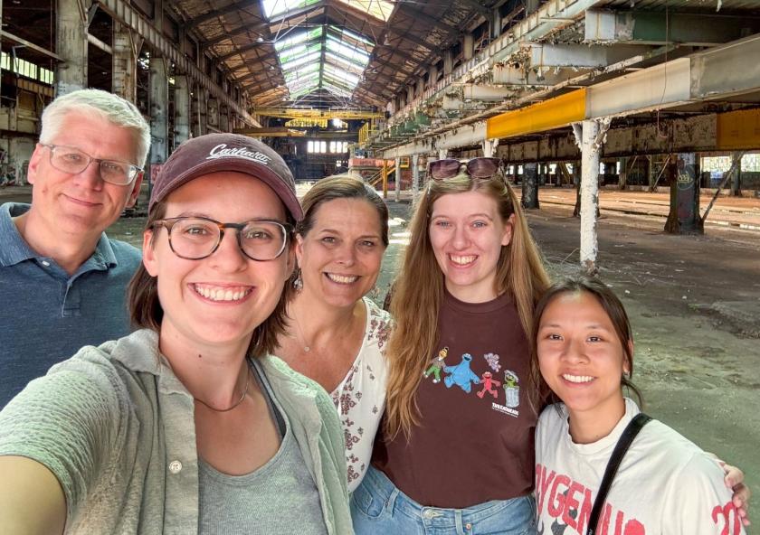 Sara Jex MCP ’25 (second from left) and family members visit 7000 Central Ave. in Cleveland, Ohio, a vacant 183,000-square-foot factory once used to manufacture Hulett unloaders. The building is among the first strategic acquisitions of the Site Readiness Fund for Good Jobs, which is working to redevelop disinvested industrial sites.