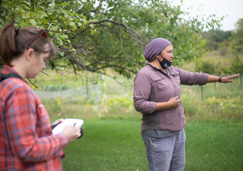 
              ESI Journalism Fellow Nora Hertel (left) takes notes during a tour with Jessika Greendeer, seedkeeper and farm manager for Dream of Wild Health, a Native American-led nonprofit with a farm just outside the Twin Cities in Hugo...