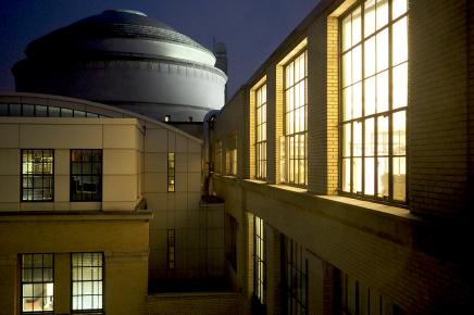 MIT dome at night with lighted windows