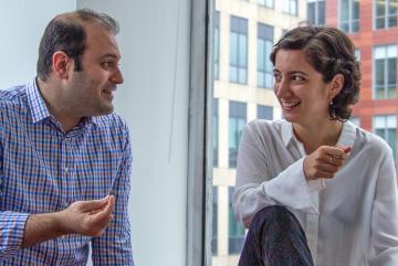 
              Ipek Bensu Manav (right) chats with Hessam AzariJafari, her colleague at the MIT Concrete Sustainability Hub. During her time at CSHub, Manav has placed engineering in its social and political contexts and built new connections in th...