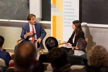 Bruno Verdini discusses strategies for natural resources negotiation with MIT Energy Initiative Communications Director Emily Dahl at a MITEI seminar.Photo: Kelley Travers/MIT Energy Initiative