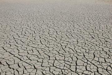 A coastal lagoon near the island of Kos, Greece, is completely dried out during the summer season. Photo:  NinjaDriverInBrussels/Wikimedia Commons