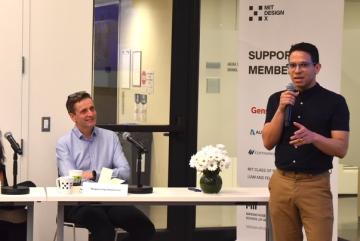 
              Miguel Dávila Uzcátegui (right) addresses questions from a panel of judges.
              Photo: Maria Iacobo
      