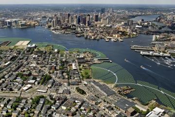 
              Aerial view photo montage of the Emerald Tutu in Boston Harbor, here shown flanking and protecting the waterfront areas of East Boston.
              Image: The Emerald Tutu
      