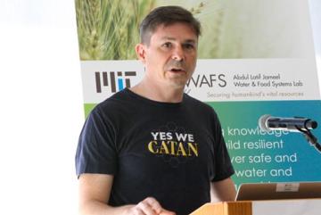 Christopher Voigt, a professor of biological engineering, presents the latest research results for a J-WAFS-funded project that seeks to engineer cereal grains to produce their own fertilizer. Photo: Andi Sutton/J-WAFS