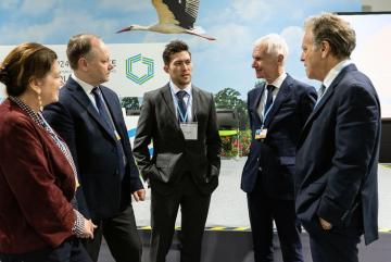 Erik Landry (center) of MIT’s Office of the Vice President for Research spoke with British Columbia’s climate minister George Heyman (far right) at the COP24 U.N. Climate Change Conference in Katowice, Poland. Joining the conversation were (lef...