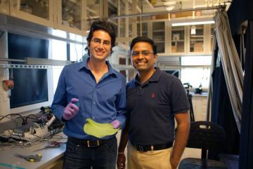 A team of researchers, including graduate student Maher Damak (left) and associate professor of mechanical engineering Kripa K. Varanasi, have found a way to drastically cut down on the amount of pesticide liquid that bounces off plants.