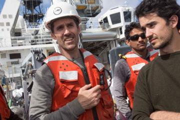 Professor Thomas Peacock (left) with graduate students Rohit Balasaheb Supekar (center) and Carlos Munoz Royo (right) aboard the RV Sally Ride.Image:  John Freidah