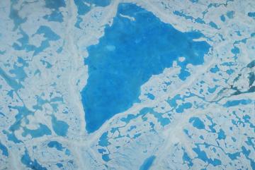 A large pool of meltwater over sea ice in the Beaufort SeaNASA/Operation IceBridge