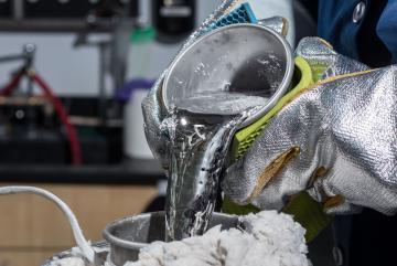 Associate Professor Asegun Henry is researching how to use superheated metals like molten tin to store heat from a concentrated solar power system, so it can be used to generate electricity as needed. Photo: Rob Felt/Georgia Tech